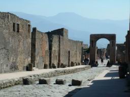 Via dell' Abbondanza. Ruins of Pompei. L'Arco di Caligola